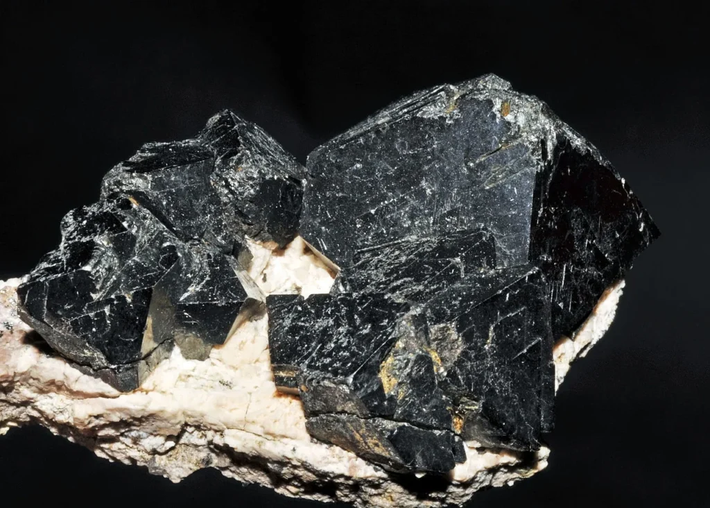 4 Crystals and Crystallization Black crystals of magnetite from Bolivia