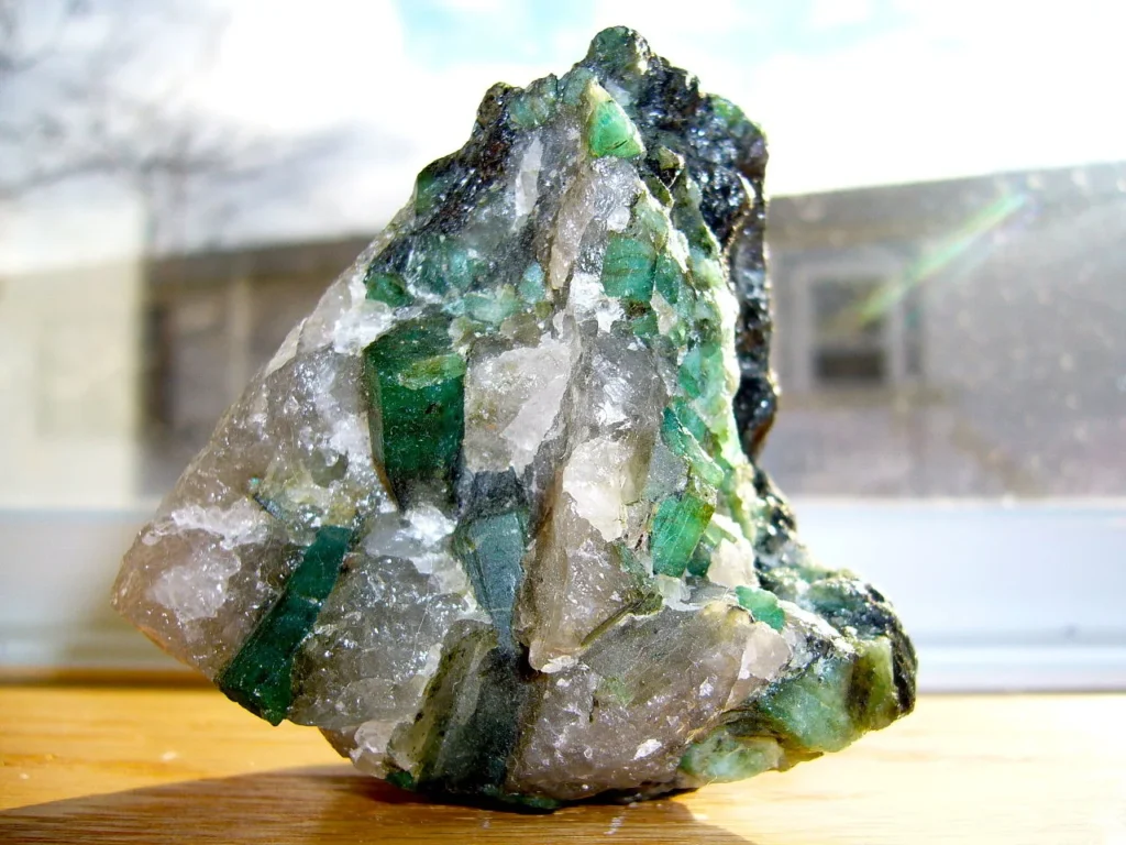 4 Crystals and Crystallization A Brazilian pegmatite containing green emerald (beryl) and quartz