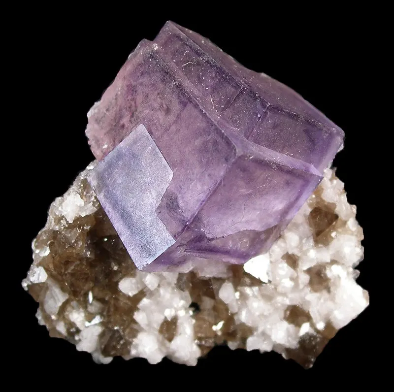 4 Crystals and Crystallization Fluorite crystals on top of scheelite and calcite