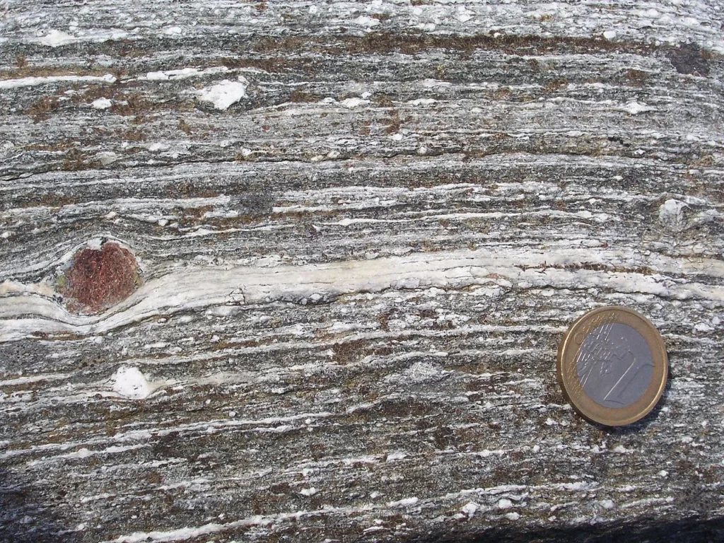 4 Crystals and Crystallization A large red garnet in a mylonite