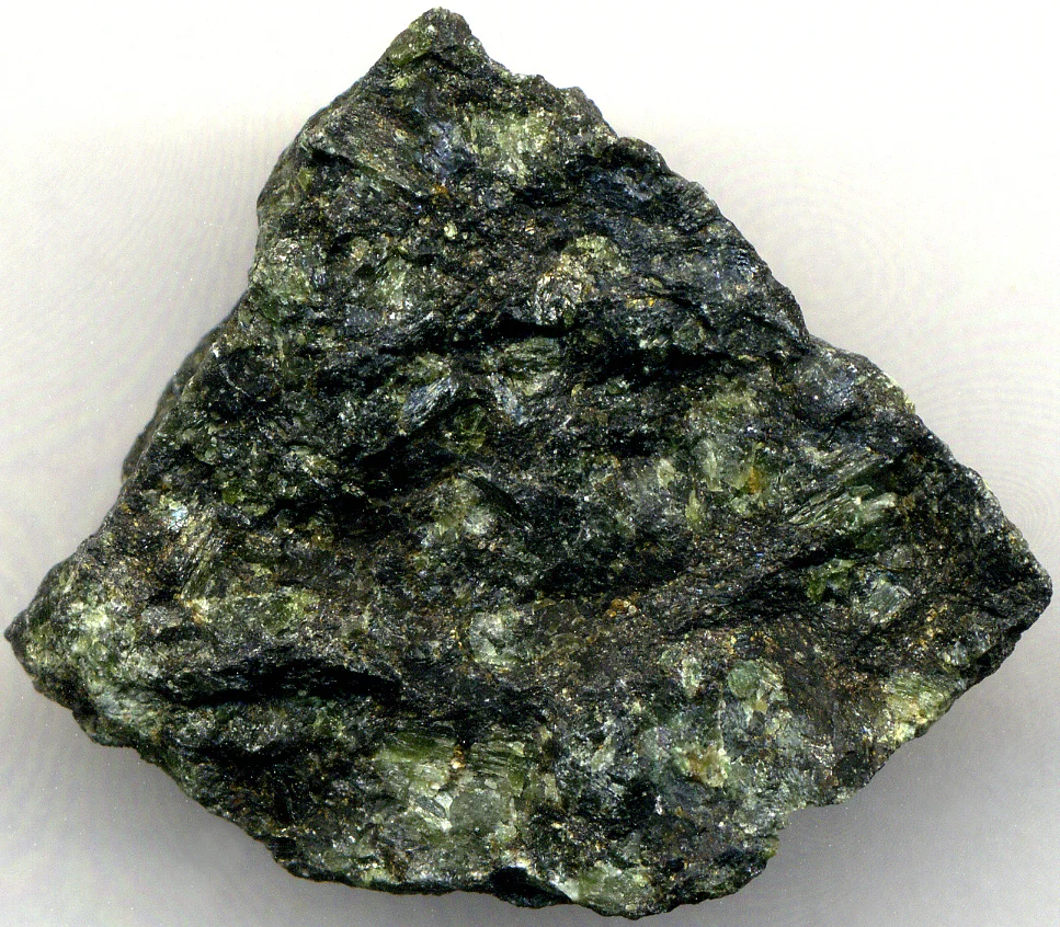 6 Igneous Rocks and Silicate Minerals Pyroxenite from the Stillwater Complex, Montana; 7 cm across.