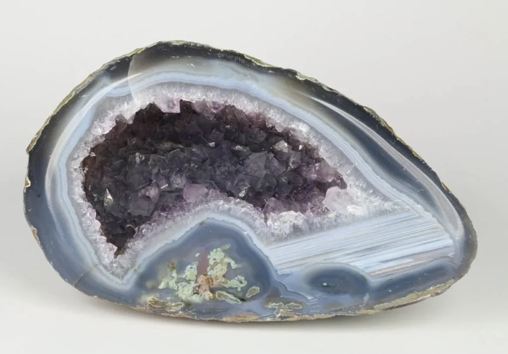 4 Crystals and Crystallization A geode with amethyst and white quartz