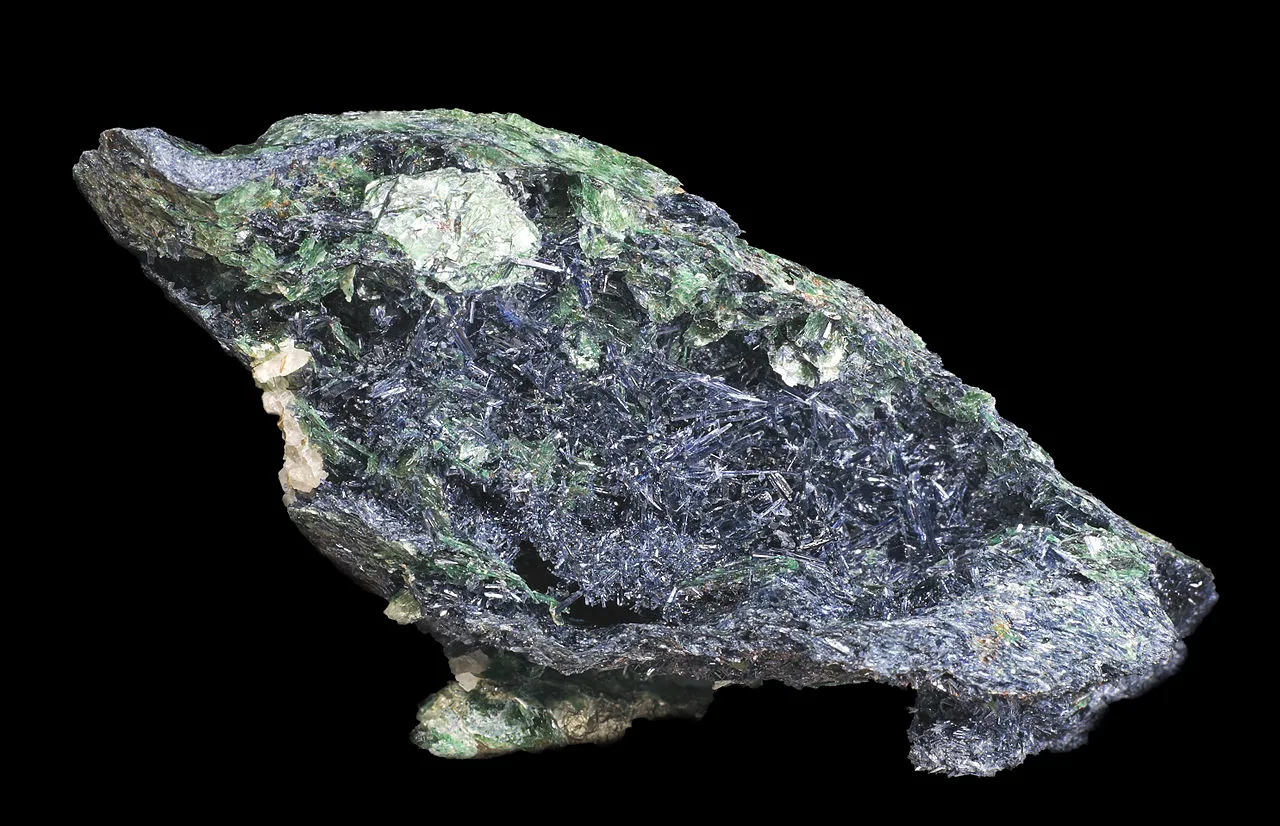 8 Metamorphic Minerals and Metamorphic Rocks  Glaucophane with fuchsite from Brittany, France. The specimen is 6.5 cm across