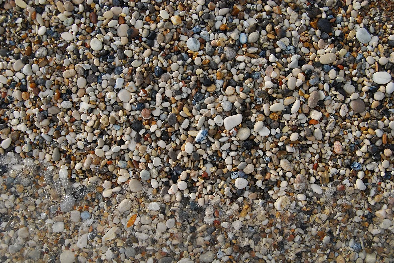 7 Sedimentary Minerals and Sedimentary Rocks Pebbles on the beach, Lychnos, Greece. Grains are 1-3 cm across.