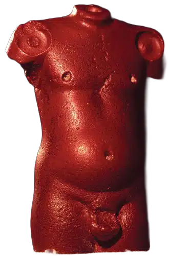 Red sandstone figure of a male torso