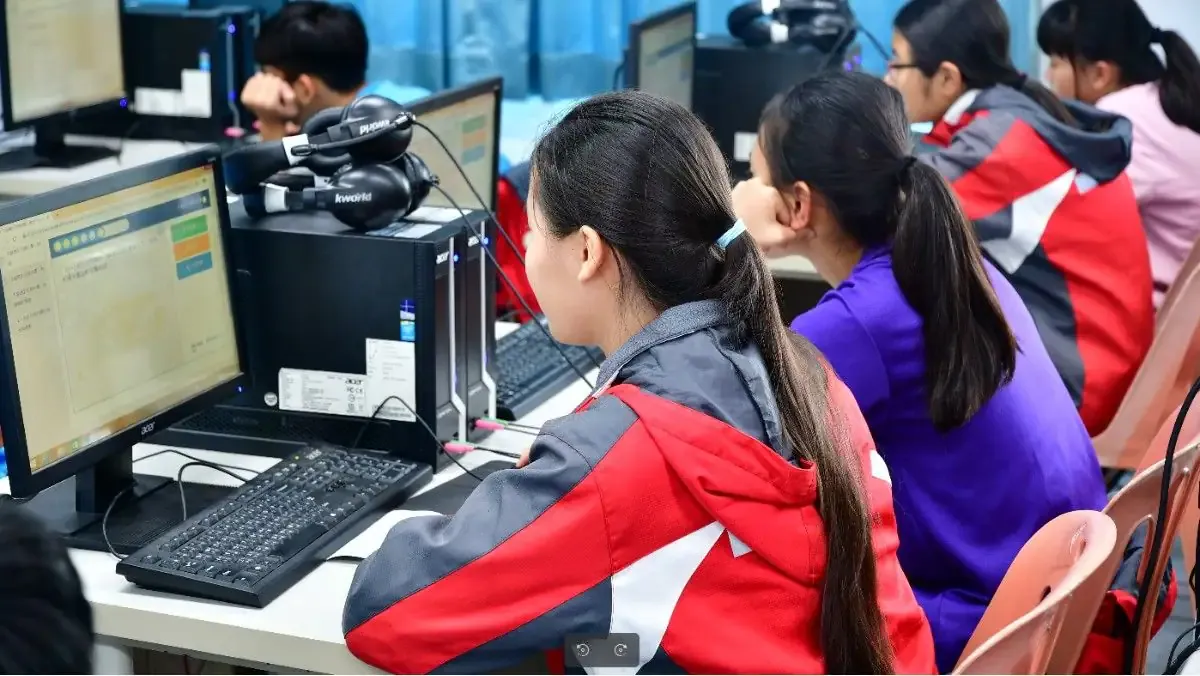 A student checking their Goa Board HSSC Result 2026 on a laptop, looking relieved and happy.