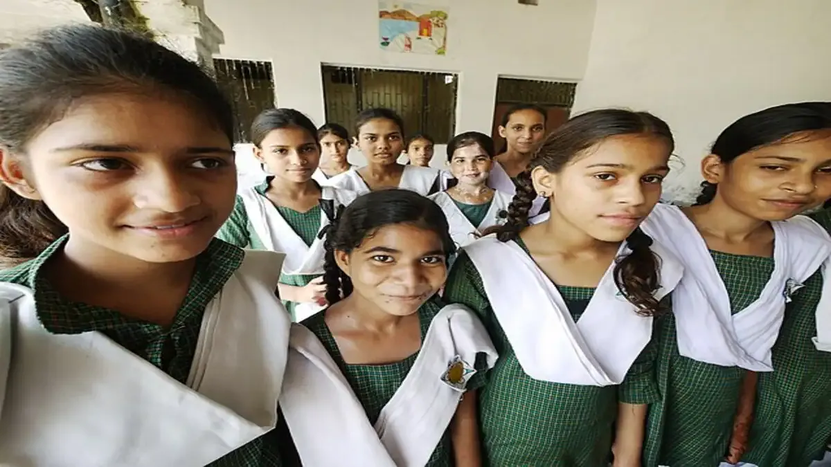 A student anxiously checking the BSEB Class 10 Result 2026 on a laptop screen with the StudyHub logo visible.