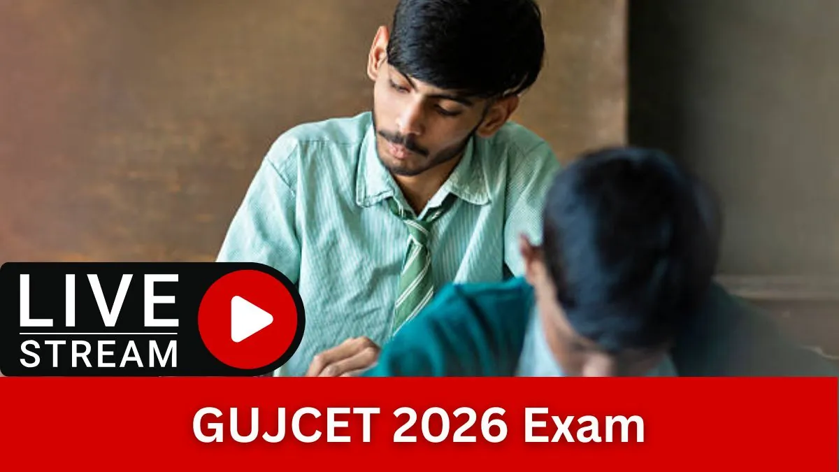 GUJCET 2026: Gates Closing! Final Checklist You Need Now A student carefully filling out an OMR answer sheet during the GUJCET 2026 entrance exam with a pen and admit card on the desk.