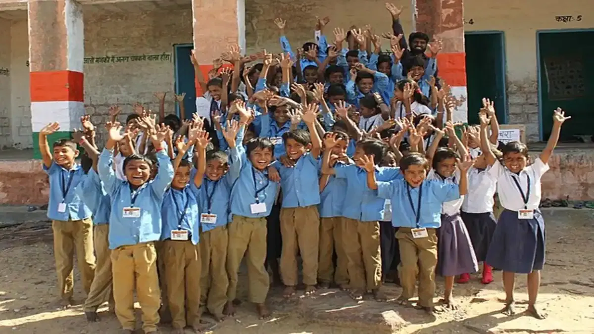 A bright, modern classroom in a newly reconstructed Rajasthan school filled with students engaged in learning.