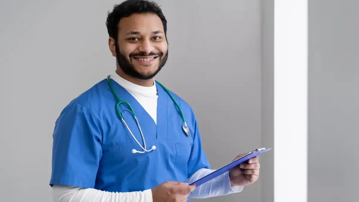 A nursing student in a uniform carefully preparing a medical instrument, representing the WB ANM GNM 2026 nursing entrance exam.