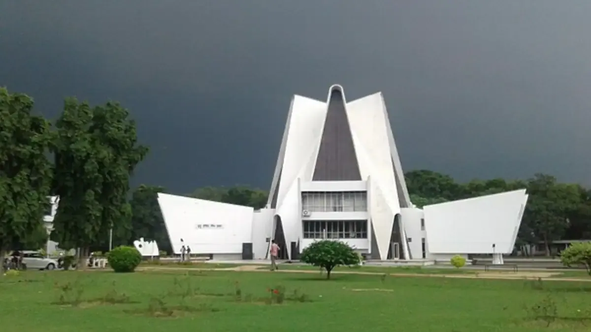 Punjab Uni's Huge Budget: What It Means for Students An aerial view of a university campus with modern academic buildings and lush green lawns, representing university budget allocation.