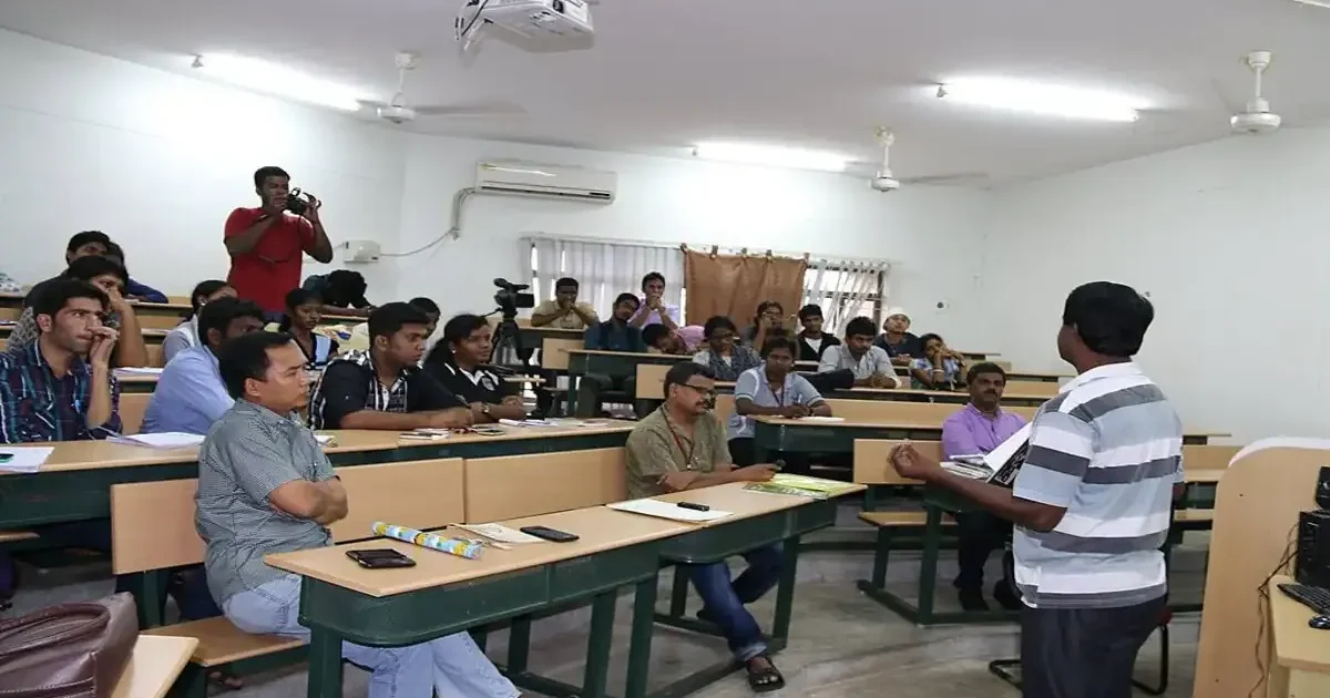 A student focused on their laptop, applying online for the NCHM JEE 2026 hotel management entrance exam before the new deadline.