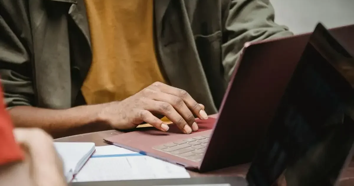 A student carefully reviewing their JEE Main 2026 Session 2 admit card on a laptop before the engineering entrance exam.