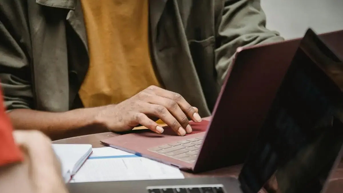 A student carefully reviewing their JEE Main 2026 Session 2 admit card on a laptop before the engineering entrance exam.