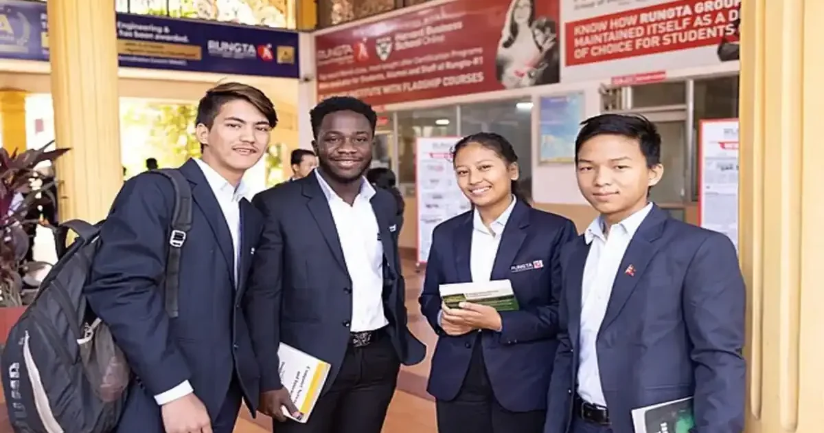 Students collaborating on a project inside a modern university library for their MBA program.