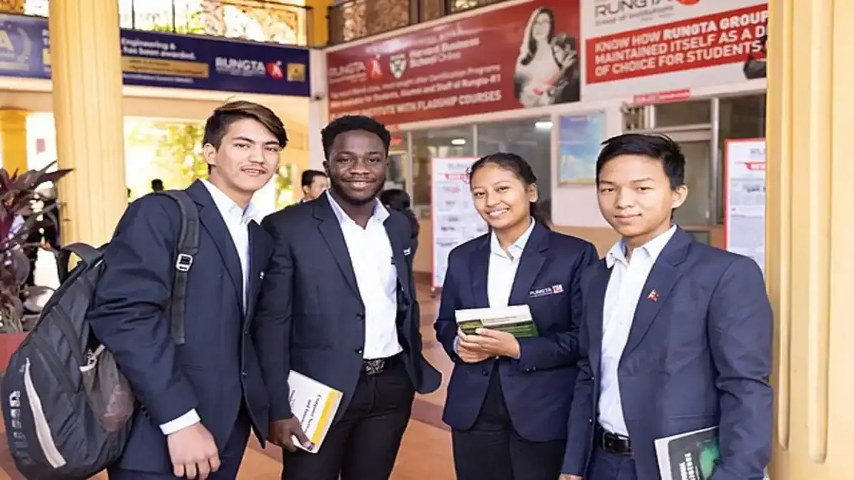 Students collaborating on a project inside a modern university library for their MBA program.