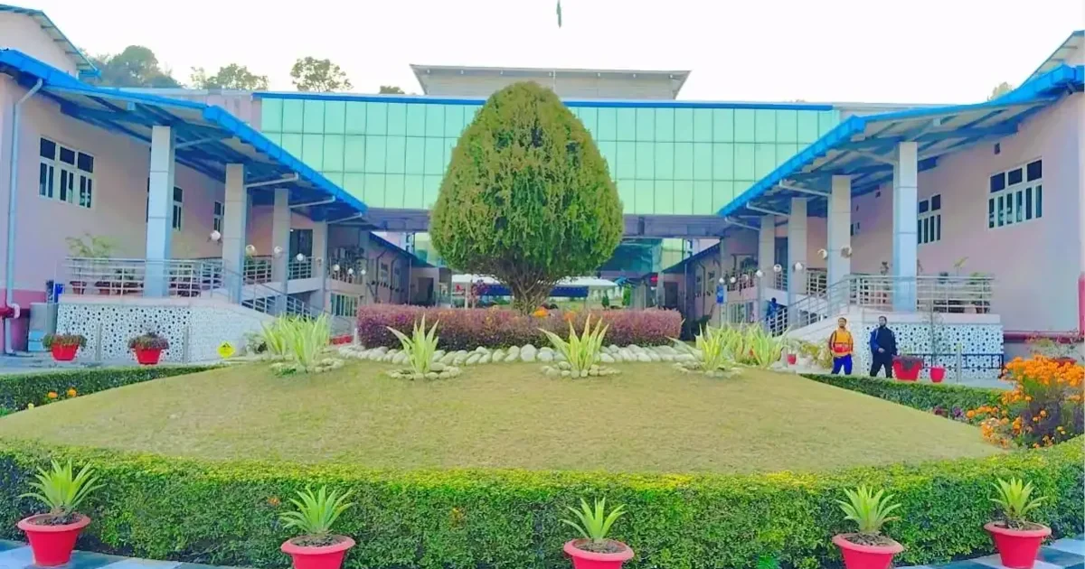 Front view of the Indian Institute of Technology (IIT) Jammu campus building with students walking by, representing the MTech Admission 2026 process.