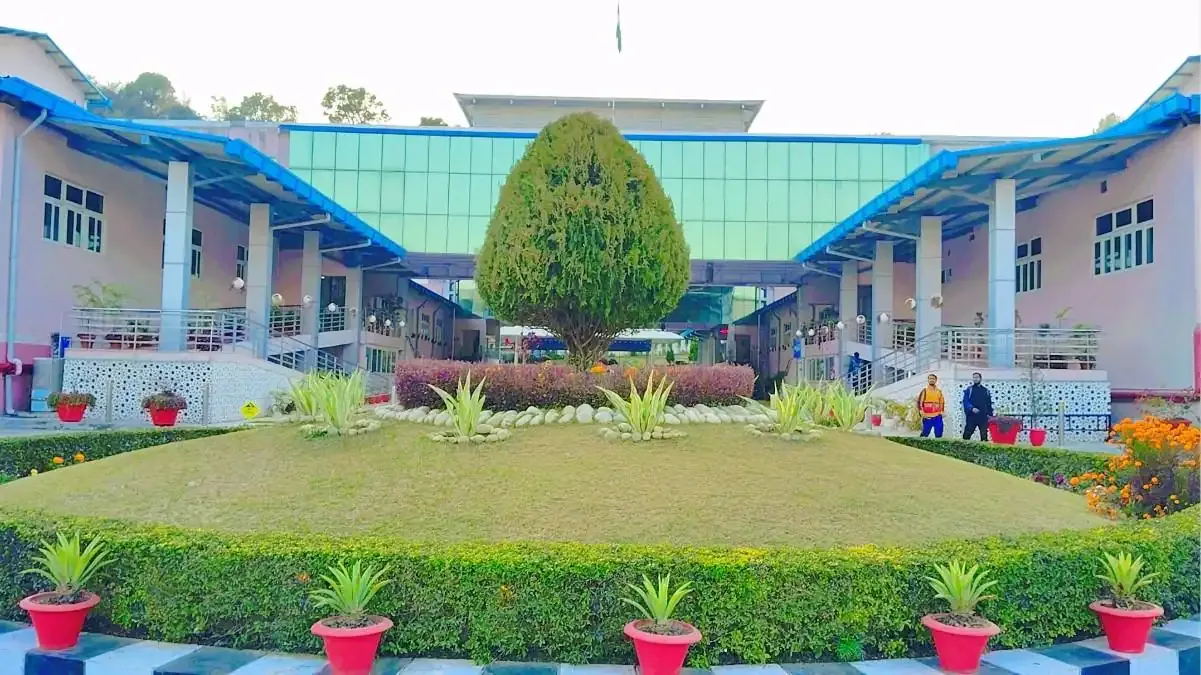 Front view of the Indian Institute of Technology (IIT) Jammu campus building with students walking by, representing the MTech Admission 2026 process.
