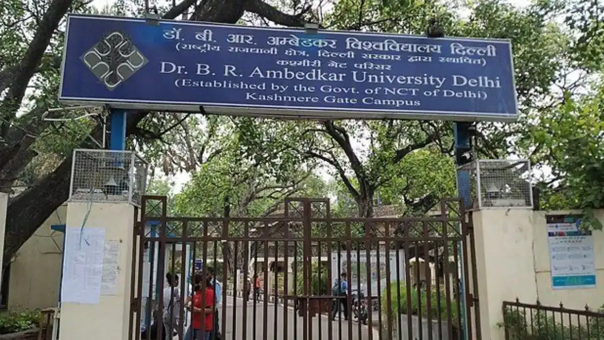 A group of university students participating in a peaceful protest on a campus, holding signs and expressing their views.