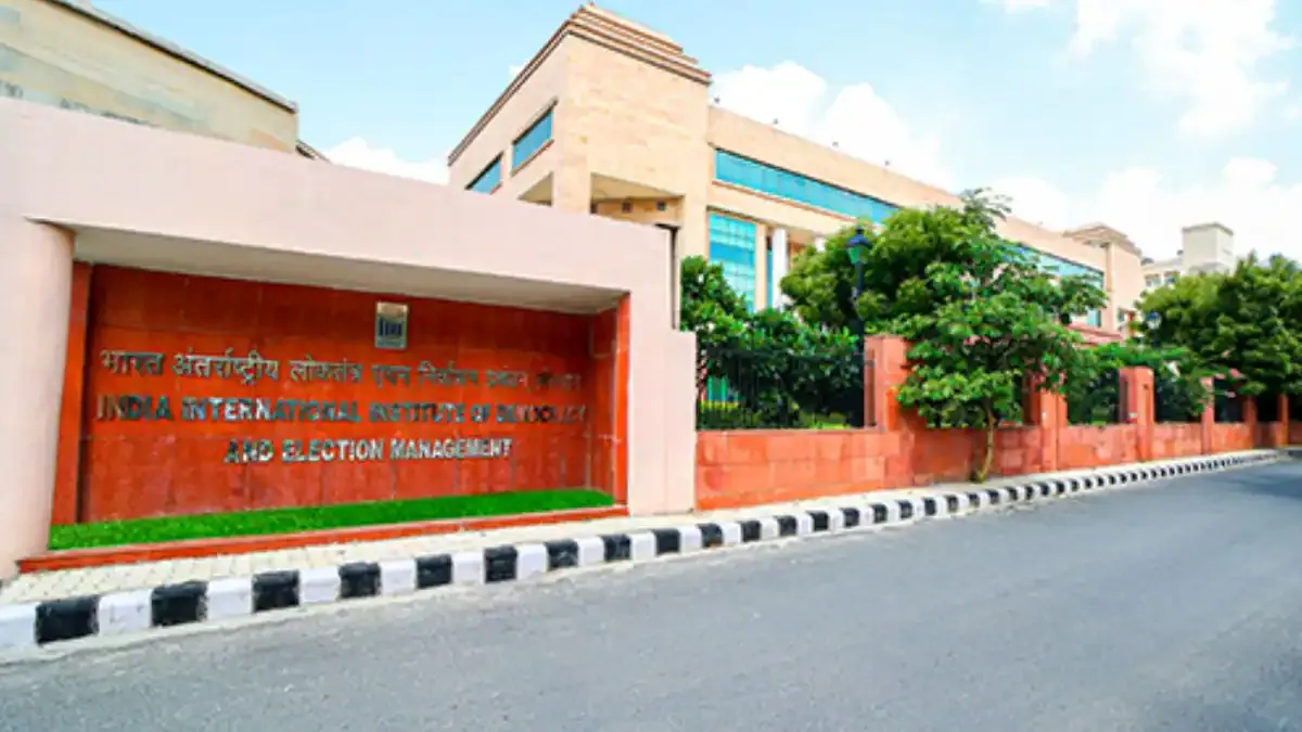Indian university students sitting in a lecture hall, learning about the new UGC academic initiatives on democracy and election management.