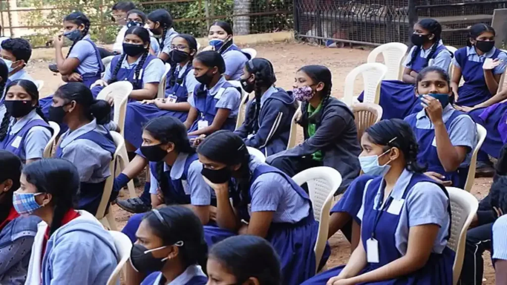 A student anxiously checking their Goa Board HSSC Result 2026 on a laptop screen with the StudyHub logo visible.