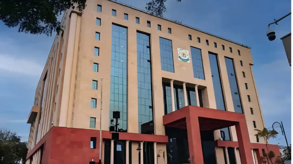 A school counsellor assisting students in a supportive environment.