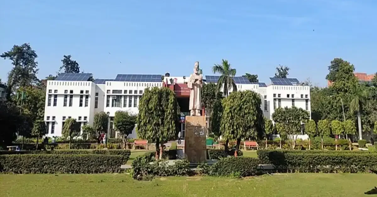 Jamia Millia Islamia campus showcasing students and academic buildings.