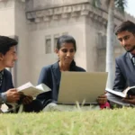 A student checking their Goa HSSC Result 2026 on a laptop, looking relieved and happy with their Class 12 scores.