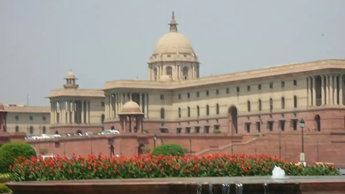 Parliament Passes New Transgender Bill: A Step Forward or Back? A diverse group of people holding rainbow flags and signs at a pride parade, advocating for transgender rights.