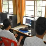 A student anxiously checking their RBSE 10th Result 2026 on a laptop screen, with the StudyHub logo visible.