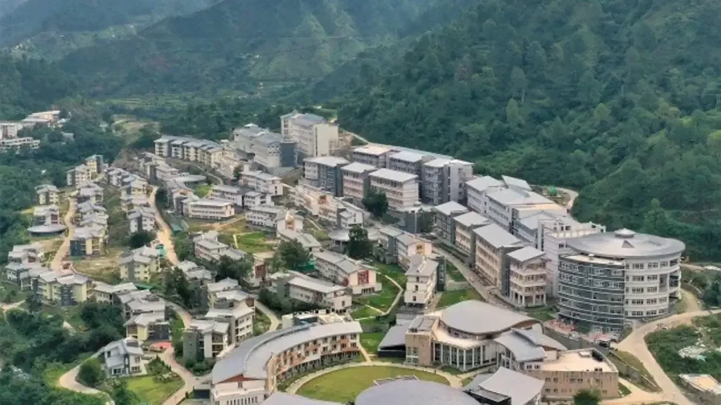 Students collaborating on laptops inside a modern classroom at an IIT campus for the HIMSHIKHAR 2026 summer program.