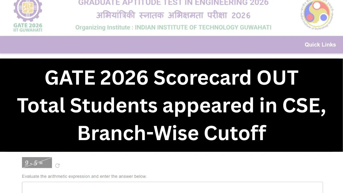 A student downloading the GATE 2026 scorecard from their laptop.