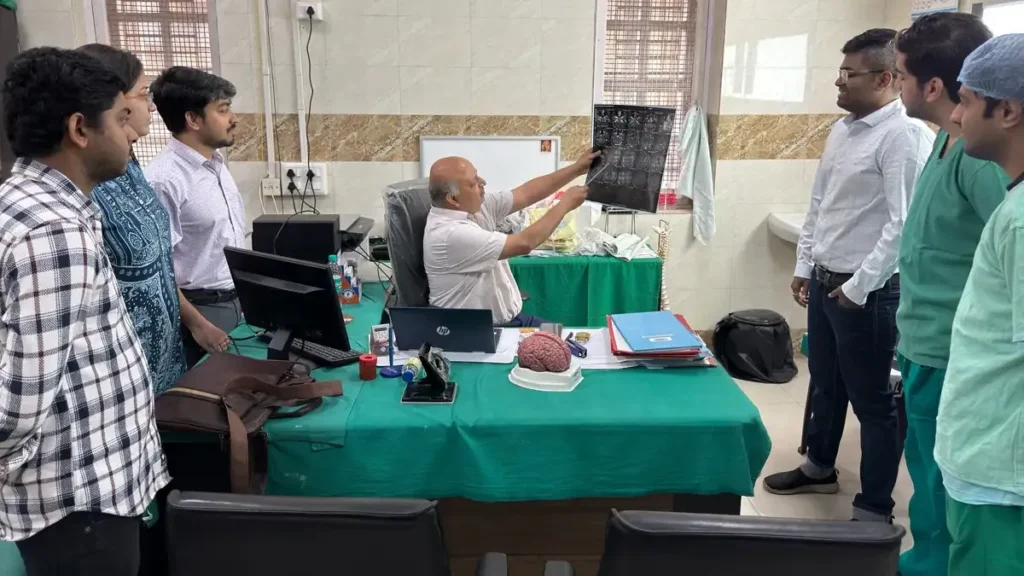 A medical student in a white coat studying a textbook in a modern university library, representing the new NMC PG regulations.