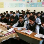 A student anxiously checking their BSEB 12th Result 2026 on a laptop screen, with the StudyHub logo visible.