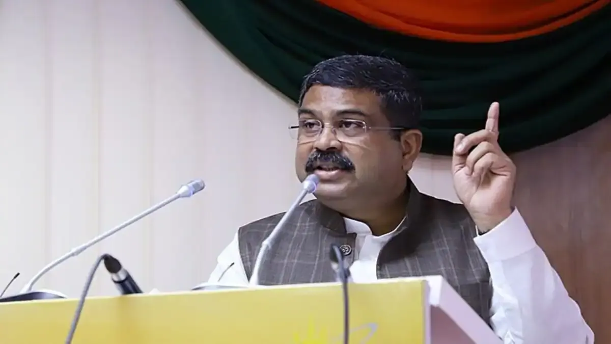 AI From Class 3? India's Huge School Revamp Revealed A young Indian student sitting in a modern classroom and interacting with an AI-powered educational program on a tablet.