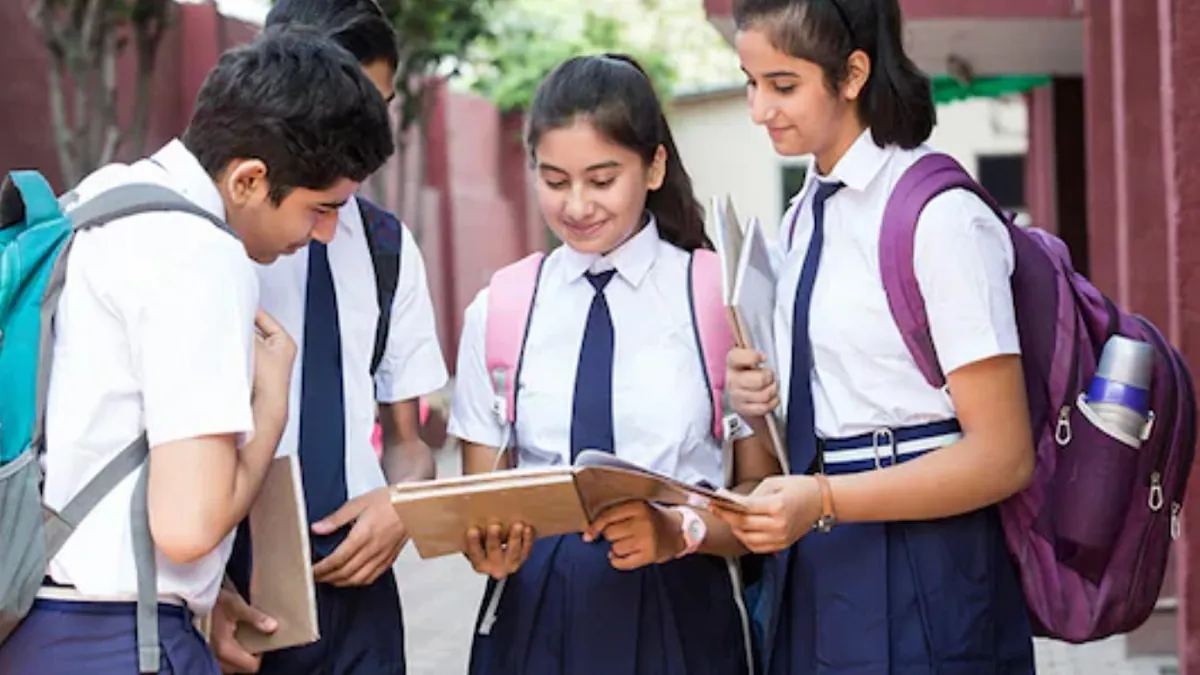 Karnataka PUC I Result Date Out? Check Your Scorecard Soon! A student anxiously checking their Karnataka PUC I Result 2026 on a notice board at their college campus.